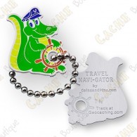  Le Traveler Navi-Gator est un micro coin trackable sur  geocaching.com . 